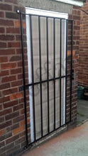 Steel door security grille / gate for home, office or garage - www.sheffarc.com