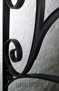 Wall mounted front steps handrail with ornamental scrolls. - www.sheffarc.com