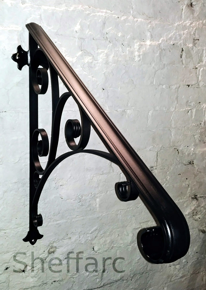 Wall mounted front steps handrail with ornamental scrolls. - www.sheffarc.com